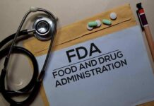 FDA Fast-Tracks Pain Pill—Who Cashes In? FDA document with stethoscope, pills, and pencil on envelope