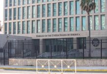 Immunity Wall Stops NYC Power Play Embassy building behind tall black security fence