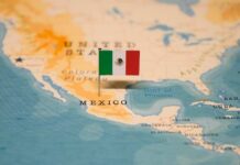 Chilling ICE Death — Mexico Demands Prosecutions Map of North America with a flag of Mexico pinned on it