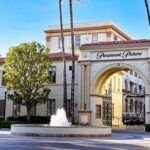 State Revolt Slams Paramount Mega-Merger Entrance gate of Paramount Pictures studio with a fountain