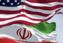 Trump’s ‘Obliterated’ Claim Unravels Flags of the United States and Iran waving together