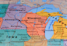 Governor Race Explodes Over Child Trans Funding Detailed map highlighting Wisconsin and surrounding Midwestern states