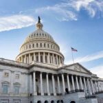 Congress Moves To Control College Sports United States Capitol building under a blue sky
