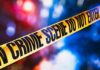 Horrific Mom Case Shocks North Dakota yellow crime scene tape with blurred police lights