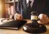 Court Torches Blanket Phone Searches Judge with gavel striking sound block