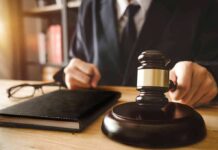 Court Torches Blanket Phone Searches Judge with gavel striking sound block