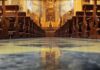 Bishop’s Letter Axes Longtime Latin Mass Church interior with wooden pews facing ornate altar