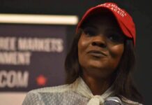 Evidence Or Bust: Owens Pressed Hard woman in a red cap holding a microphone