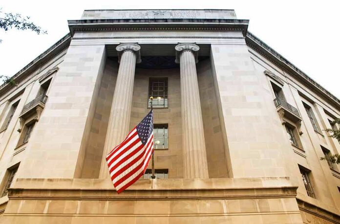 shutterstock_1275008332 American flag hanging on a neoclassical government building