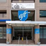 Teachers’ Union Torches Target — Pensions Exposed? aft headquarters building entrance with blue shield logo