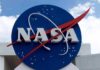 Space Medal Bombshell Drops in Houston NASA logo on a large blue circular sign