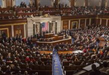 Speech Crackdown? Congress Targets Doxxing Legislative chamber filled with attendees during a formal address