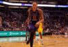 Olympic Icon Torches WNBA’s ‘Woman’ Gap basketball player dribbling on a court during a game