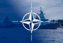 Russia’s Gray-Zone Gambit Rattles NATO NATO emblem overlaying naval ships in the ocean.