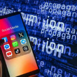 AI Imposters Milk Veterans – Platforms Exposed Smartphone showing social media apps with text background.