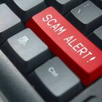 Government Email Trap Exposes Revolut Records Keyboard with red scam alert key
