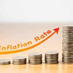 Gas Spike Torches Inflation Calm stacks of coins increasing with upward arrow