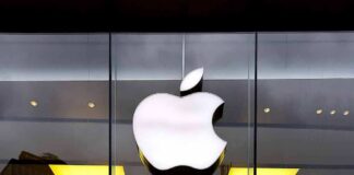 Apple logo on glass storefront