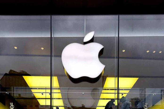 Apple logo on glass storefront