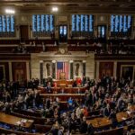 Congressional Revolt Hits Pentagon Chief U.S. House chamber with lawmakers gathered before a session