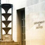 DOJ Gambit Sparks Supreme Court Clash Department of Justice building exterior with sign and metal sculpture