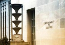 DOJ Gambit Sparks Supreme Court Clash Department of Justice building exterior with sign and metal sculpture