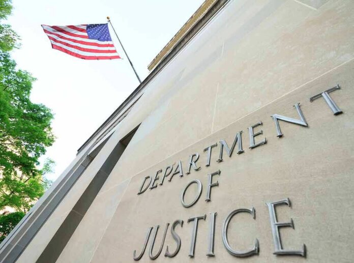 shutterstock_1384089731 Department of Justice building with American flag