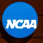 NCAA Immunity Deal Sparks Fury NCAA logo on a blue circular sign