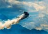 Fatal Double Tragedy Grips LA Airspace Helicopter releasing smoke over mountains