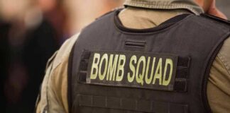 Bomb squad officer wearing tactical vest