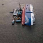 Nighttime Blaze Traps Dozens Off Palawan Capsized cargo ship with salvage vessels alongside