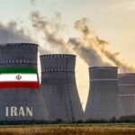 Two-Week Meltdown? Treasury Rings Iran Alarm nuclear power plant cooling towers in Iran at sunset