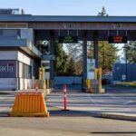Tariff Crossfire: Prices Spike, Jobs On Edge Canada border crossing booths with open and closed lane signs
