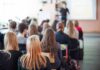 Campus Fury Over Abortion Turns Violent Students seated in a classroom listening to a presentation