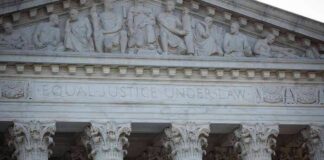 Supreme Court building facade with Corinthian columns and frieze