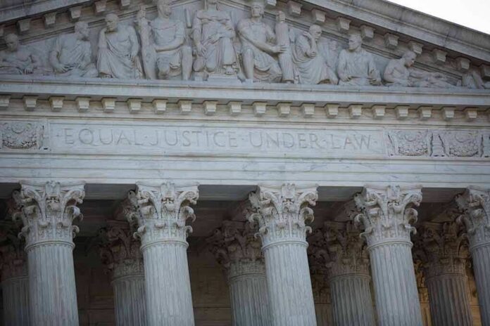 shutterstock_1835442250 Supreme Court building facade with Corinthian columns and frieze