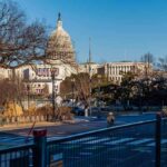 Emergency Power Play — D.C. Control Shift U.S. Capitol building behind security fencing and a quiet street