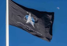 Pentagon Turbocharges Space Troops United States Space Force flag waving against a blue sky