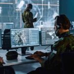 Cartel Crackdown: Colombia Invites U.S. Strikes Military analysts at computers in a command center