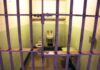 Parole Bombshell Jolts Menendez Saga Interior of a prison cell with a toilet, sink, and metal bars