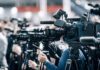 Sabotage Clue Triggers Normandy Train Horror Broadcast cameras on tripods at a press event