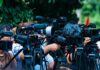 Fourth-Quarter Chaos Buries Ohio State TV news cameras crowding together at an outdoor event