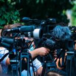 Fourth-Quarter Chaos Buries Ohio State TV news cameras crowding together at an outdoor event