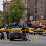 Classroom Chaos: Blade Attack Stuns Sweden Police investigate a taped-off urban street crime scene