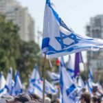 Golan Gambit Ignites Global Backlash Israeli flags waved at a street demonstration