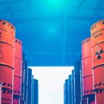 Man-Made Uranium Triggers U.S. Deal Radioactive waste barrels stacked in rows inside a facility