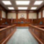 Jury Gridlock Freezes Chilling Mom-Murder Case Empty courtroom with wooden benches and judge's bench