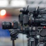 Ceuta Deluge Sparks Nationwide Fury Professional video cameras on tripods