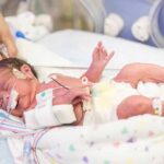 Abortion Dispute Explodes Into Custody Clash Premature newborn in NICU with monitoring tubes