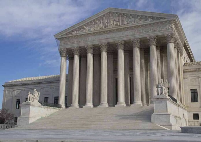 shutterstock_92660524-2 Supreme Court building with grand columns and steps